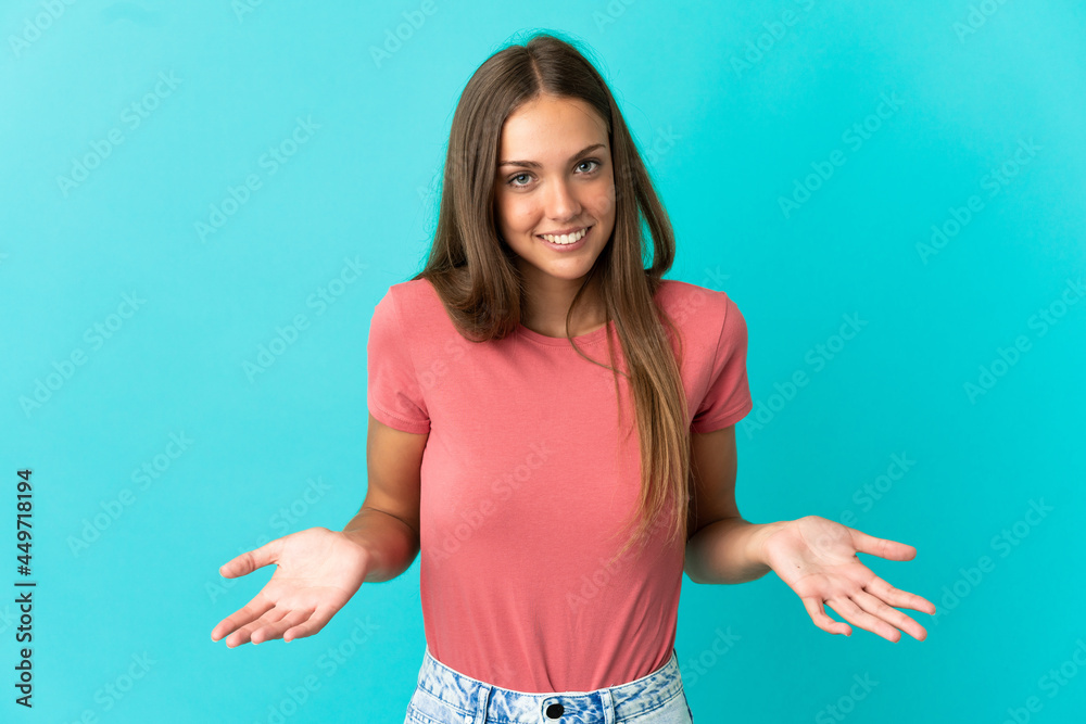 Young woman over isolated blue background happy and smiling Young woman over isolated blue background happy and smiling