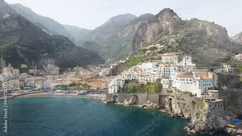Panoramic aerial view of Amalfi coastline from a moving drone, Campania - Italy.