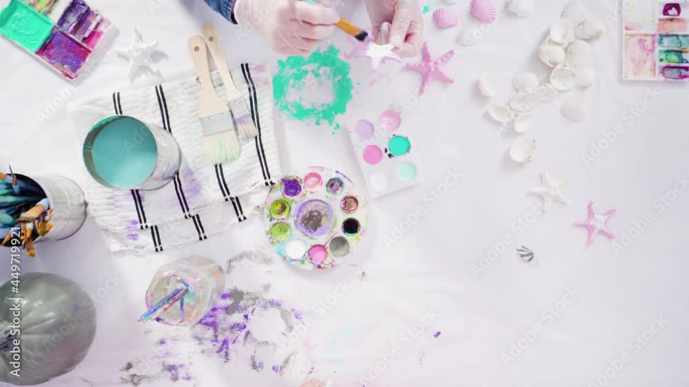 Flat lay. Step by step. Painting craft pumpkin with acrylic paint to create decorated mermaid Halloween pumpkin. Flat lay. Step by step. Painting craft pumpkin with acrylic paint to create decorated mermaid Halloween pumpkin.