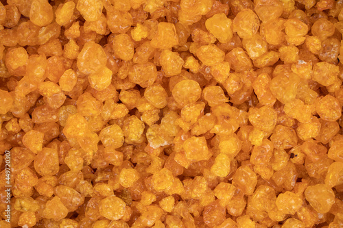 Golden raisins close up. Macro. Whole background.