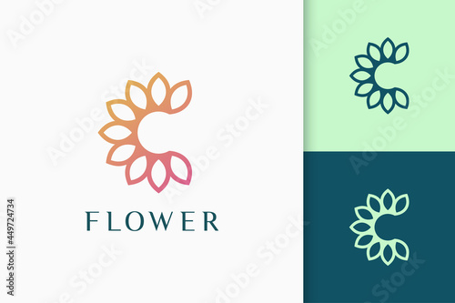 Flower or nature logo in initials or letter c shape for spa and beauty