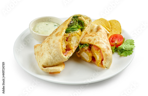 tortilla with fried chicken and vegetables
