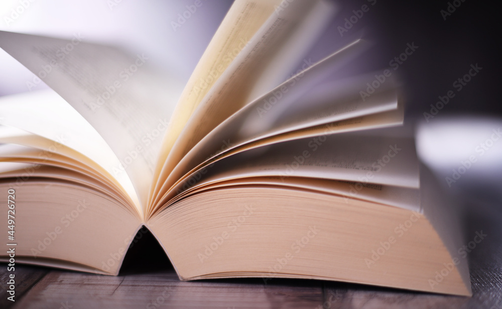 Obraz premium Composition with open book on the table