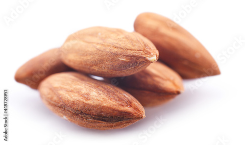 Composition with shellless almonds isolated on white