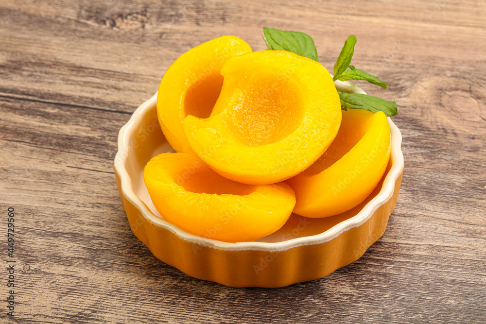 Sweet ripe canned peaches with mint Sweet ripe canned peaches with mint