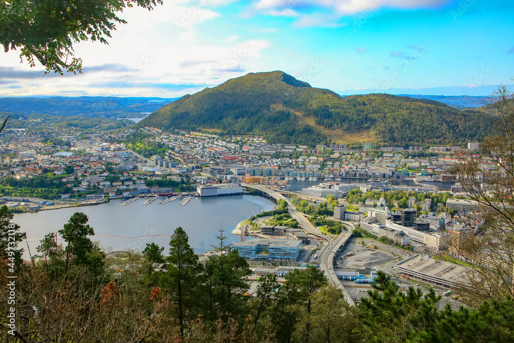 View from the top of the Floibanen funicular and Mount Fløyen. Spectacular panoramic view over the city, with buildings, fjords and mountains, Bergen, Norway.