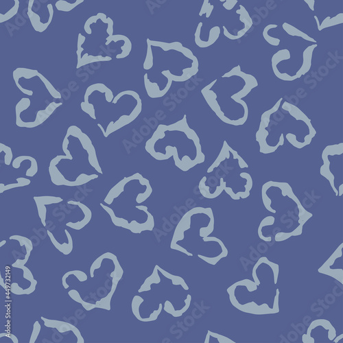 Leopard heart seamless pattern. Vector animal print. Light blue spots on blue background. Jaguar, leopard, cheetah, panther fur. Leopard skin imitation can be painted on clothes or fabric.
