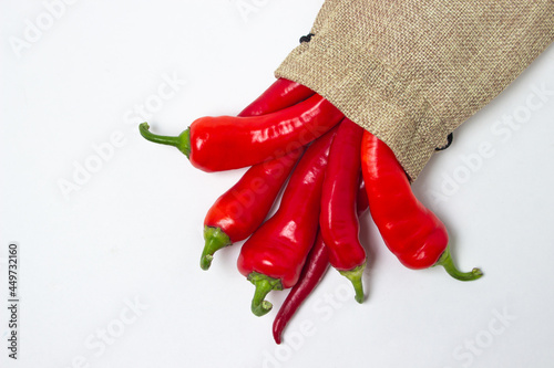 Red hot chili peppers in a bag on a white background. Chili pepper isolated