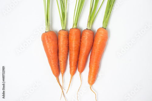 Fresh ripe carrots on a white background. Isolated carrot
