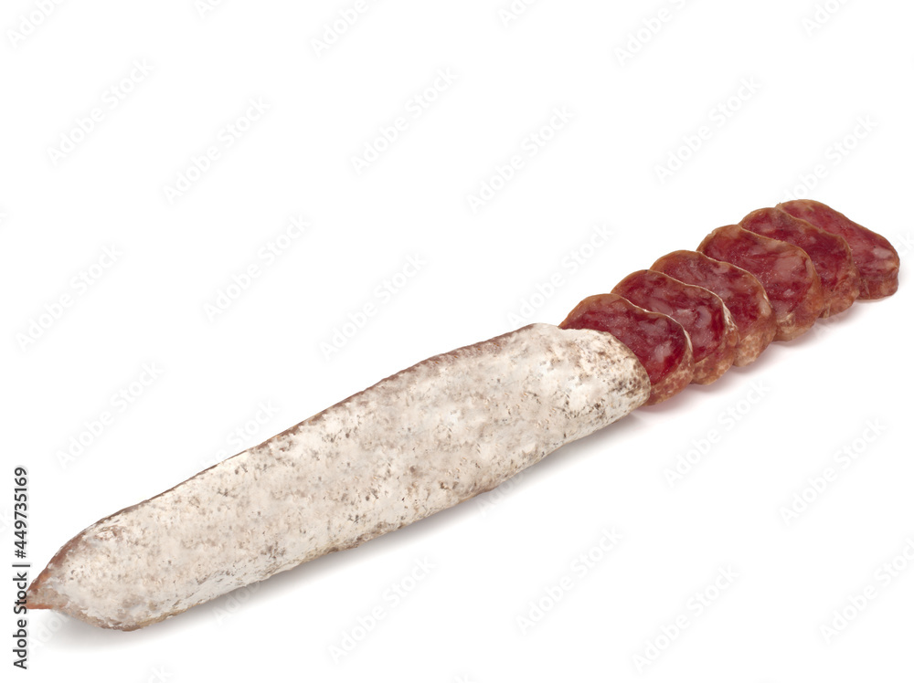 Traditional Spanish Fuet thin dried sausage with slices, Close-up, isolated on a white background Traditional Spanish Fuet thin dried sausage with slices, Close-up, isolated on a white background