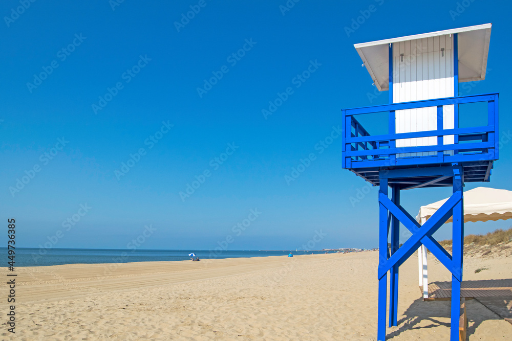Lifeguard post on the beach of Casita Azul in Isla Cristina, Huelva, Andalusia, Spain Lifeguard post on the beach of Casita Azul in Isla Cristina, Huelva, Andalusia, Spain