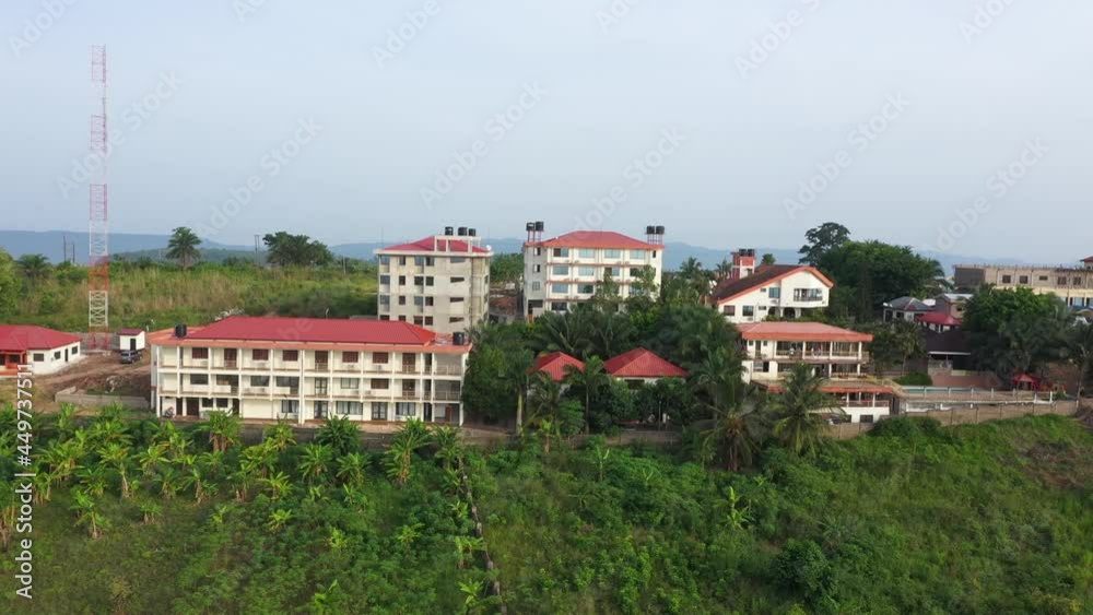 Aerial Ho Ghana hotel resorts on tropical jungle mounta. Capital city of the Volta Region along the border to Togo. Rural landscape, African villages and markets. Destination for tourism and vacation. Aerial Ho Ghana hotel resorts on tropical jungle mounta. Capital city of the Volta Region along the border to Togo. Rural landscape, African villages and markets. Destination for tourism and vacation.