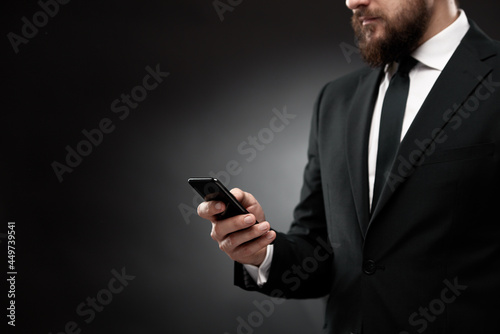 Man's hands using smart phone screen