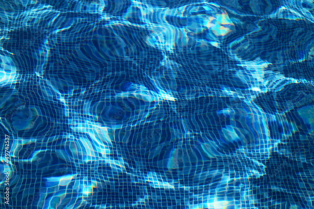 Blue bright transparent background of pool water
