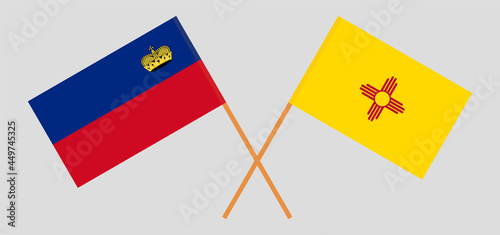Crossed flags of Liechtenstein and the State of New Mexico. Official colors. Correct proportion