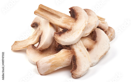 Sliced champignons, close-up, isolated on white background.
