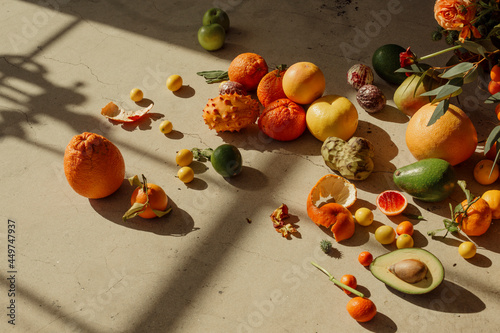 Fototapete Still life of tropical fruits included citruses, avocados and dragonfruit in win