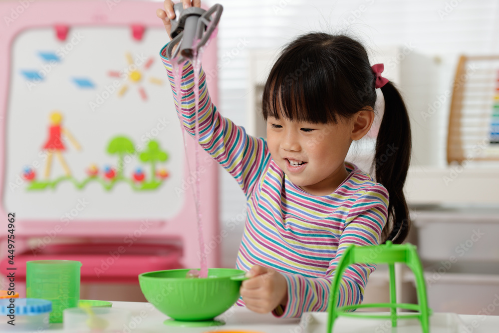 young girl making slime at home young girl making slime at home