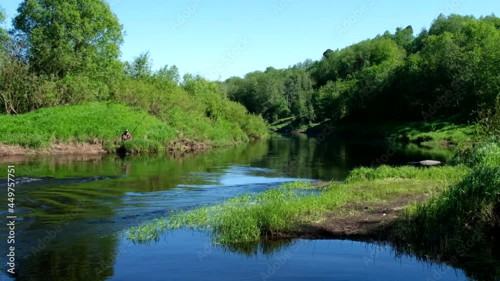 Fisher at the bank of the river Fisher at the bank of the river