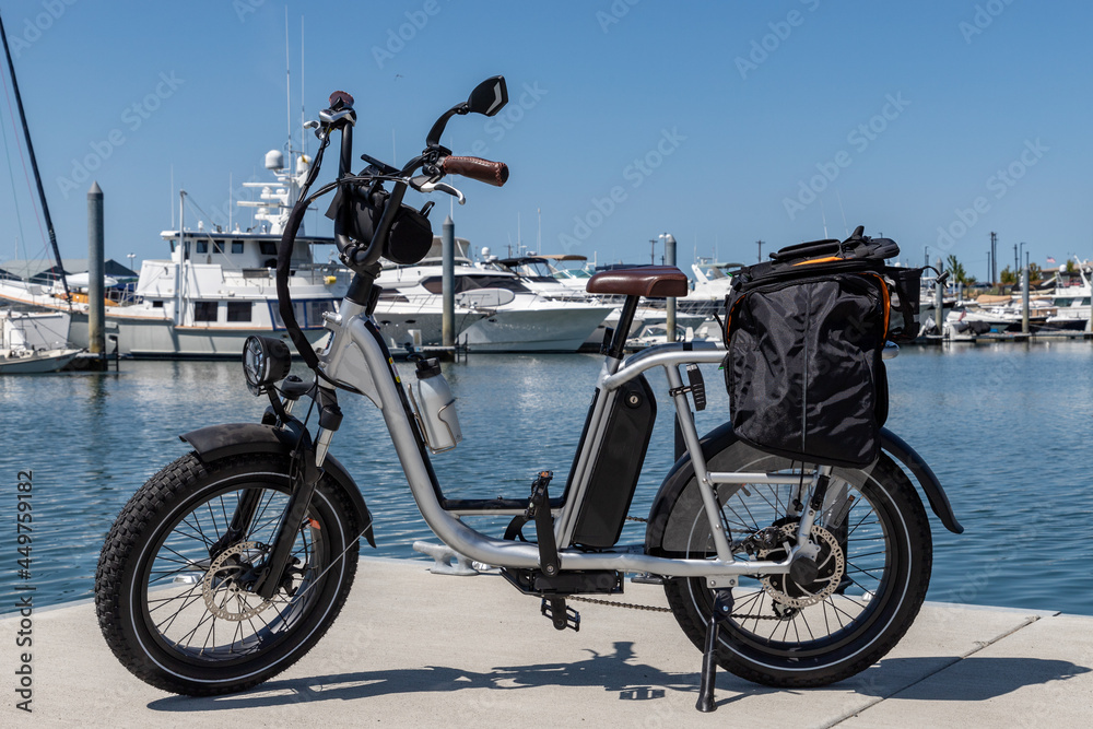 Fototapeta premium Electric Moped Style Bicycles At Port of Everett Dock