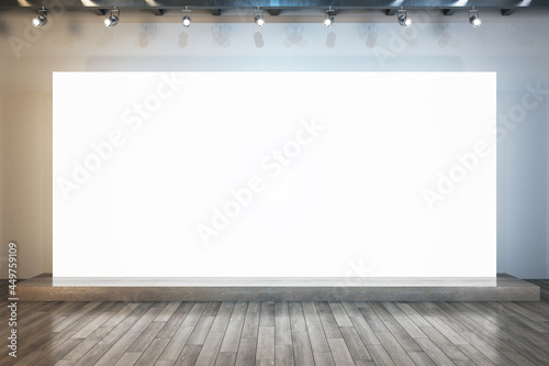 Fototapeta Naklejka Na Ścianę i Meble -  Illuminated empty white poster in interior with wooden flooring and mock up place for your advertisement. 3D Rendering.