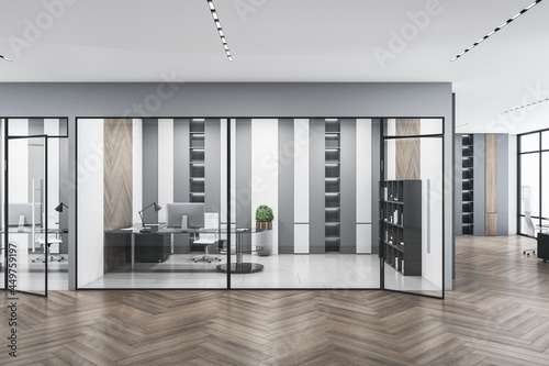 Modern concrete glass office interior with daylight and wooden flooring. Workplace design concept. 3D Rendering.