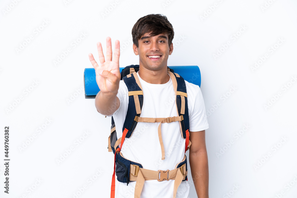 Young mountaineer woman with a big backpack over isolated white background happy and counting four with fingers Young mountaineer woman with a big backpack over isolated white background happy and counting four with fingers