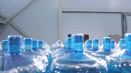 Large plastic empty bottle. A range of custom made empty 5 gallon refillable bottles
