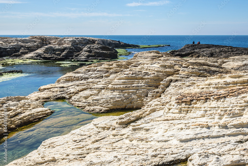 Naklejka premium Rocks next to famous Pigeon Rock in Raouche district of Beirut capital city, Lebanon