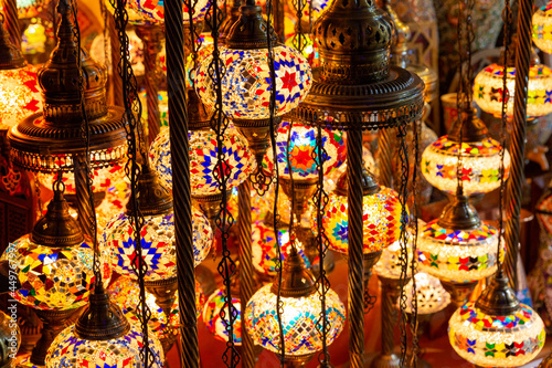 beautiful traditional arabic lamps displayed in souvenir shop in atlantis the palm in palm jumeirah, dubai, united arab emirates