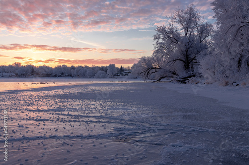 Sunrise over frozen lake 