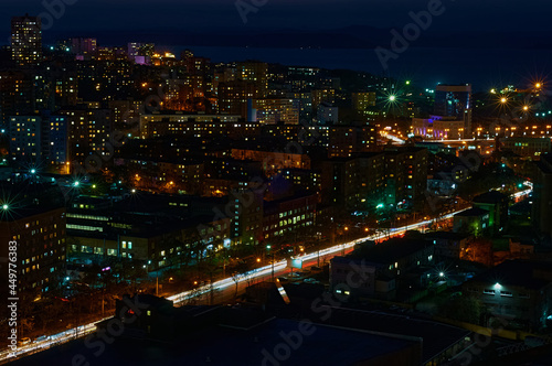 Aerial view of the night city of Vladivostok, Russia. Car traffic. © Алексей Игнатов