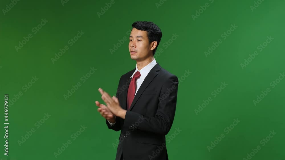 Young Asian Businessman In Suit Jacket Standing And Presenting Something On Green Screen Background, Chroma Key
Young Asian Businessman In Suit Jacket Standing And Presenting Something On Green Screen Background, Chroma Key