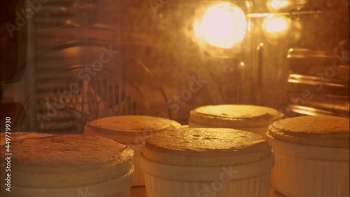 4K Timelapse of baking pastries in bakery oven with high temperature at the kitchen. Homemade of baking process of souffle in the oven.