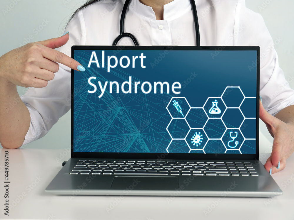 Alport Syndrome text in menu. Doctor looking for something at laptop Alport Syndrome text in menu. Doctor looking for something at laptop