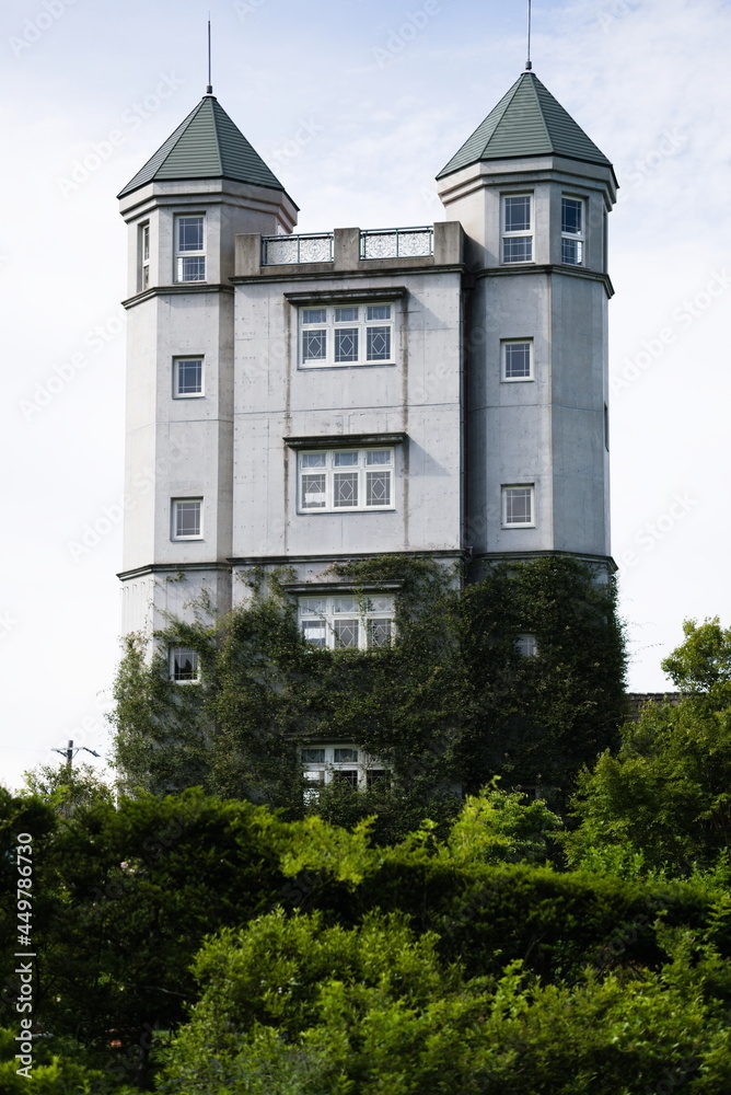 The symbol tower towering over the rose garden The symbol tower towering over the rose garden
