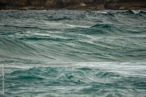 waves in the rough seas on a stormy day