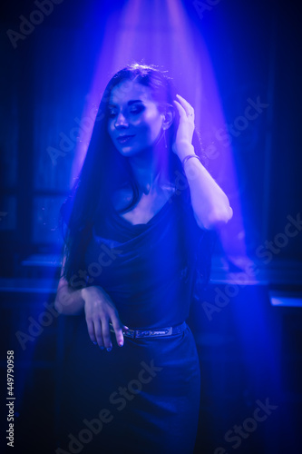 woman having fun dancing at night disco club