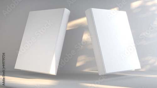 Fotografia Blank book cover template with front and back pages placed on a white surface on natural light