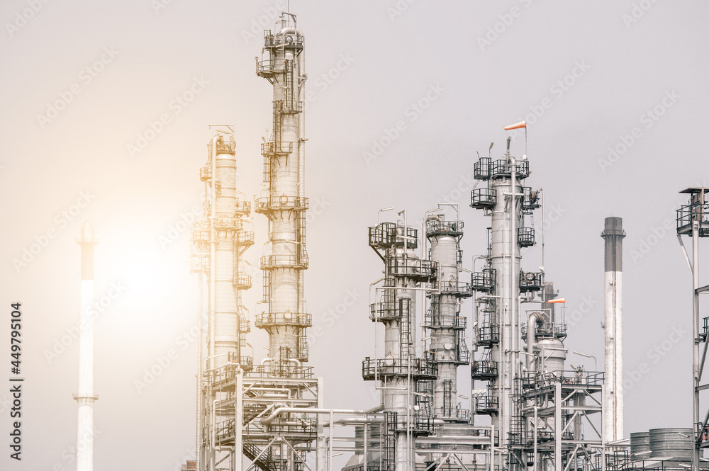 Obraz premium Industrial zone,The equipment of oil refining,Close-up of industrial pipelines of an oil-refinery plant,Detail of oil pipeline with valves in large oil refinery.