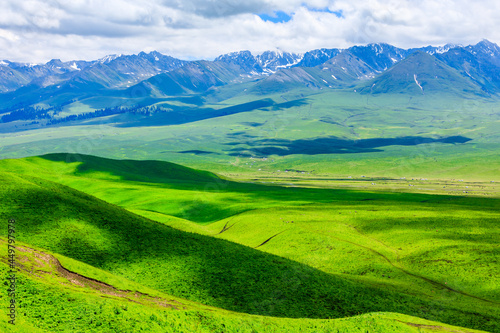 Nalati grassland with beautiful mountain natural landscape in Xinjiang,China. © ABCDstock