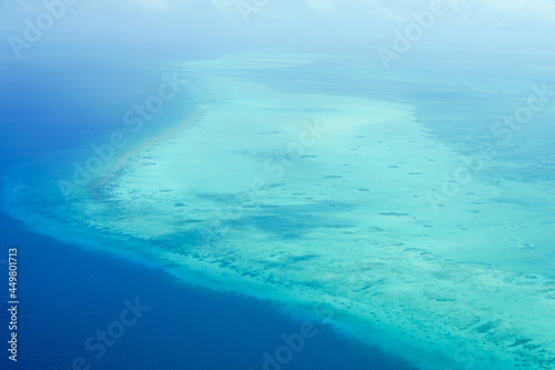 The Caribbean Sea with a beautiful blue gradation seen from the sky