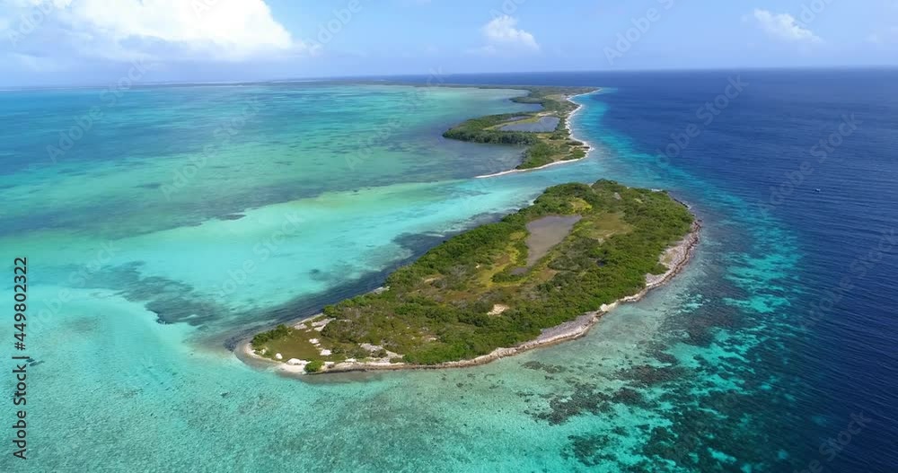 Los roques Venezuela over with blue water Moving-turn pan LEFT aerial view boca de Cote Caribbean sea Los roques Venezuela over with blue water Moving-turn pan LEFT aerial view boca de Cote Caribbean sea