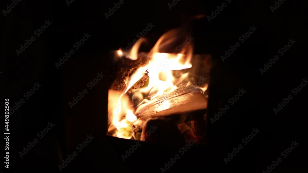 cosy winter outdoor firepit with beautiful flames burning wood and cardboard, cosy winter outdoor firepit with beautiful flames burning wood and cardboard,