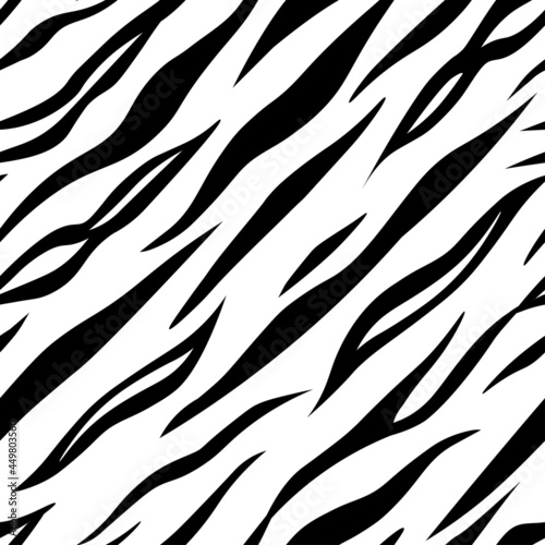 A set of seamless wild animal coloring patterns. The skin of a tiger  giraffe  leopard  zebra  cheetah. Contemporary background for printing. Imitation of camouflage. Vector graphics.