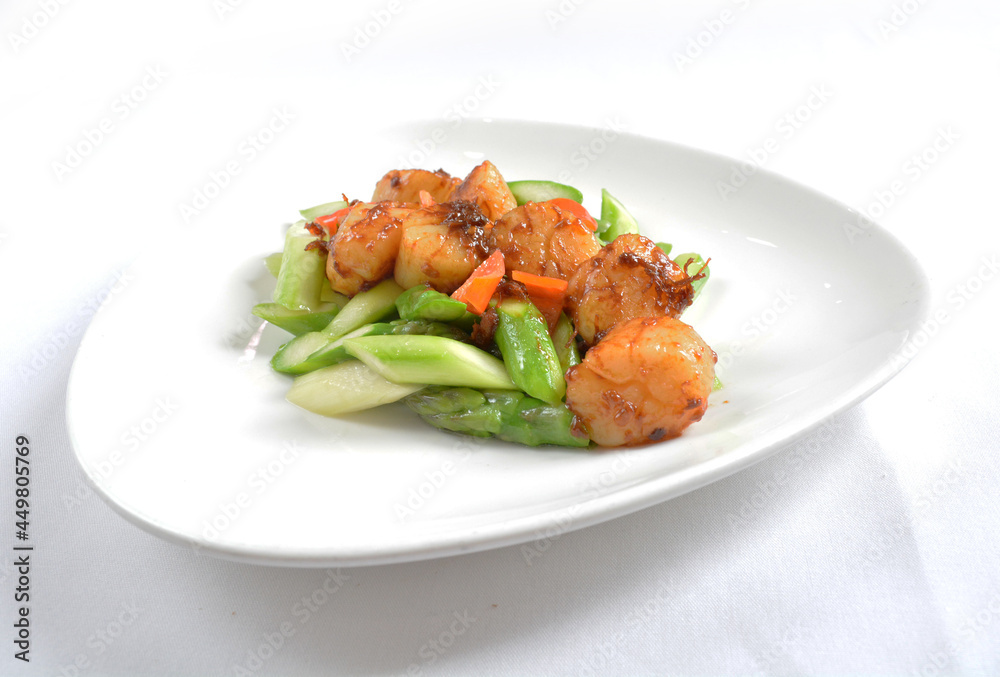 stir fried scallop with vegetables in spicy samba xo chilli sauce seafood in white background asian halal menu stir fried scallop with vegetables in spicy samba xo chilli sauce seafood in white background asian halal menu