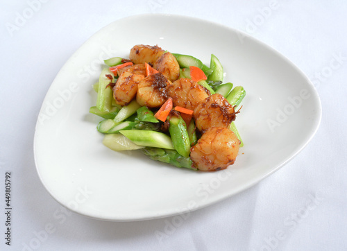 stir fried scallop with vegetables in spicy samba xo chilli sauce seafood in white background asian halal menu