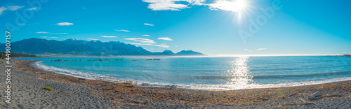 Panoramic view of Kaikoura beach on a sunshine day. Kaikoura is a town on the east coast of the South Island of New Zealand, the popular tourist destination, mainly for whale watching.
