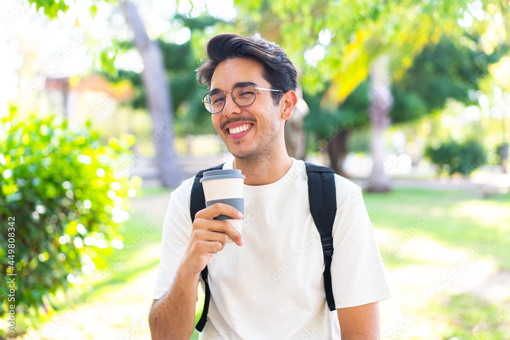 Young student man at outdoors with happy expression Young student man at outdoors with happy expression