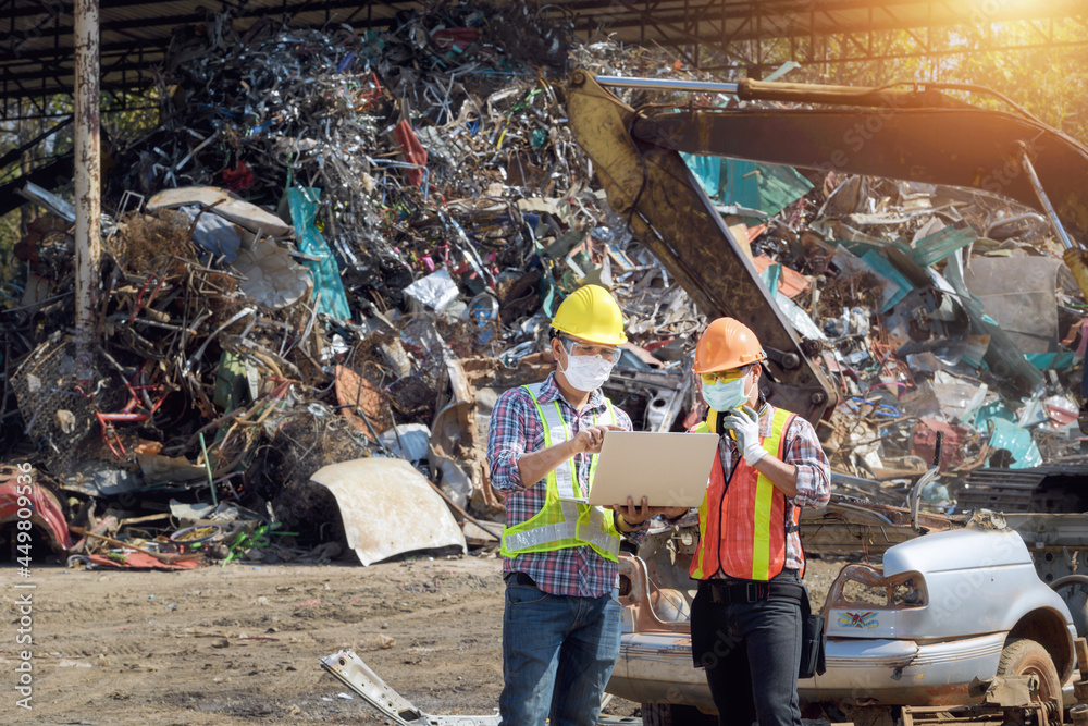 Recycling industry a worker who recycling thing on recycle center.Manager and Manual Worker in Metal Landfill Recycling industry a worker who recycling thing on recycle center.Manager and Manual Worker in Metal Landfill